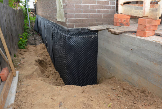 SJ Waterproofing Pros technician performing targeted Sump Pump Installation assessment in Hiram, GA